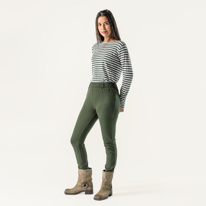 Side view of luxury organic cotton trouser leggings for women, highlighting the flattering fit and slight stretch of the jersey fabric.