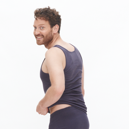 Close-up view of the high-quality organic cotton fabric of the ribbed vest, highlighting its soft texture and sustainable materials.