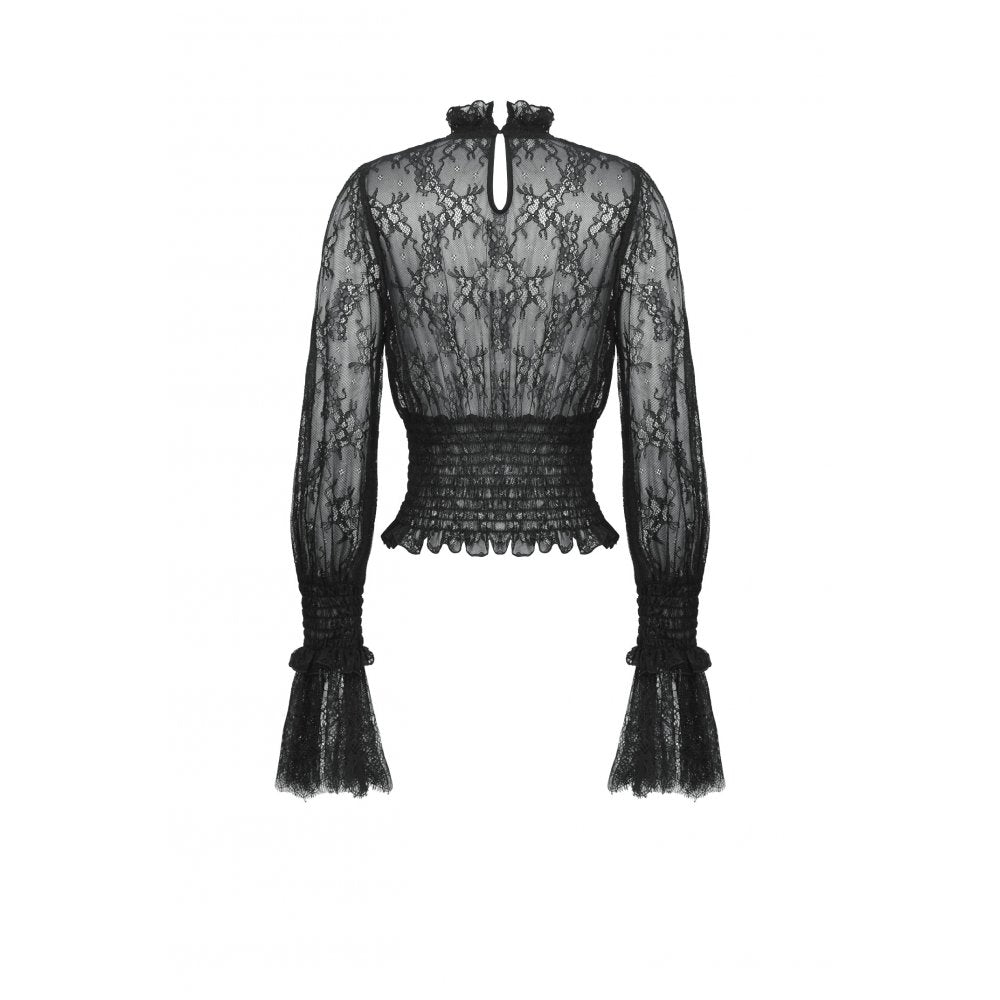 Detail of the elastic pleated waist and eyelash lace cuffs of the Aoife Black Lace Top, showcasing comfort and sophistication.