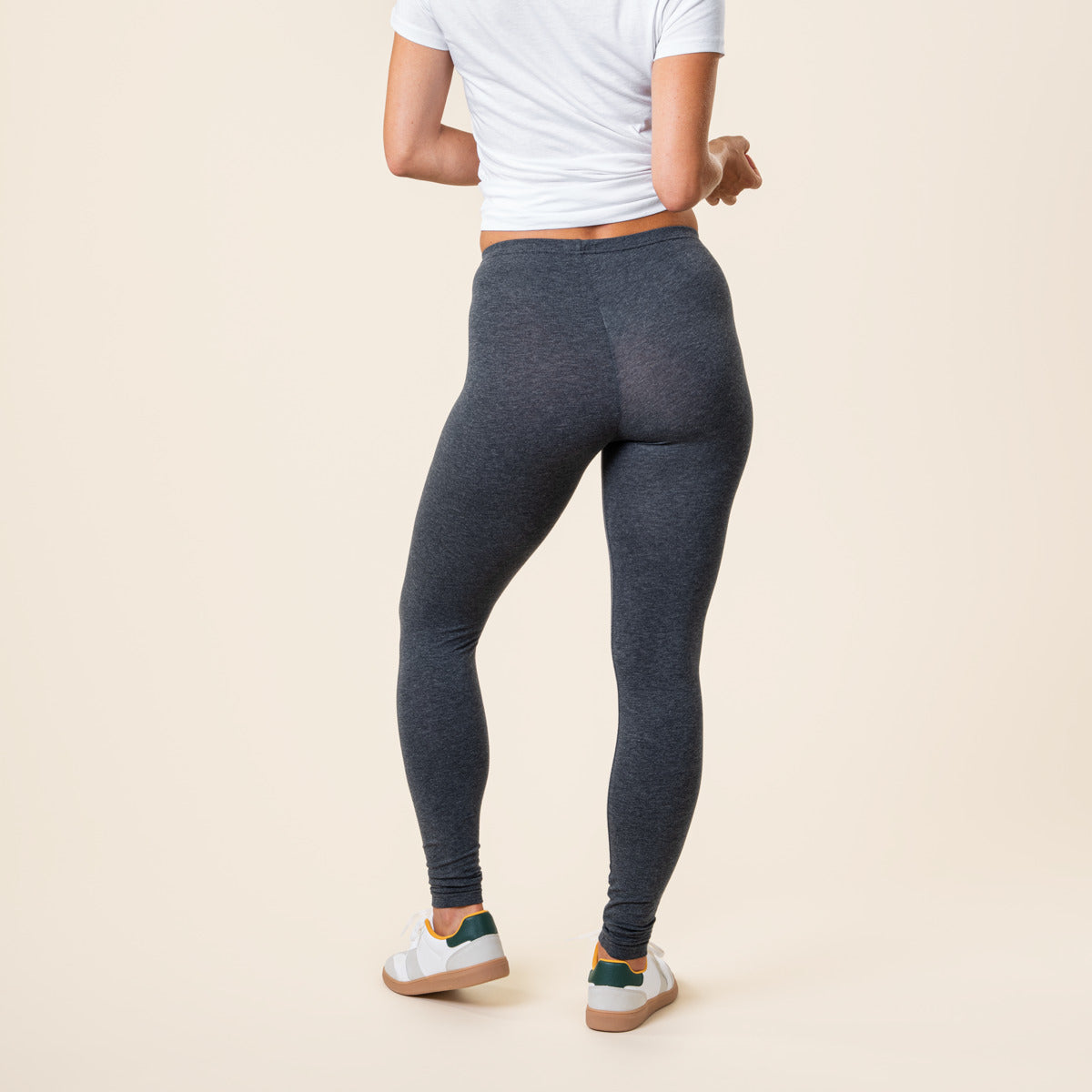 Flat lay of high-rise organic cotton stretch leggings, displaying their stylish design and breathable fabric, ideal for chic everyday wear.