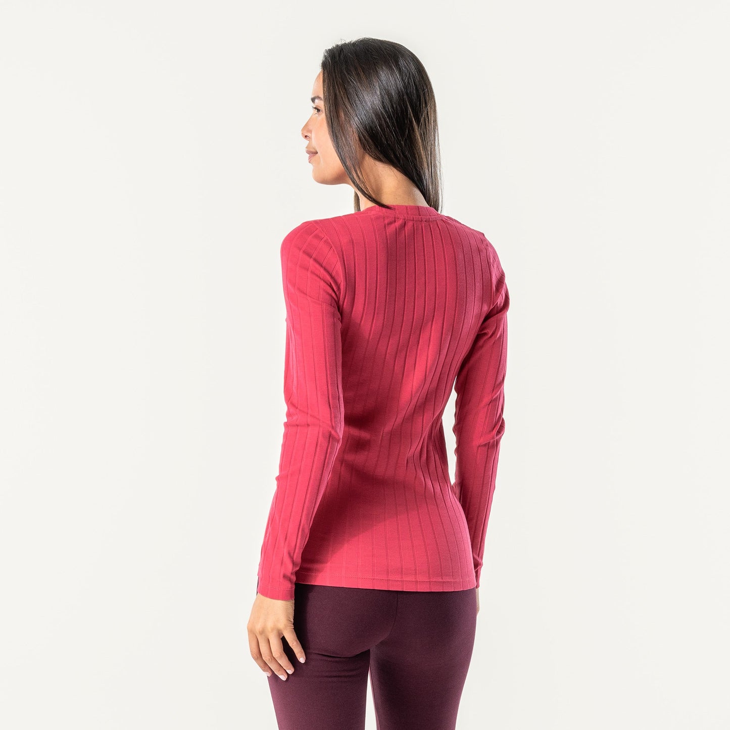 Chic silhouette of the women's organic cotton long sleeve T-Shirt, perfect for layering or worn as a standalone piece.
