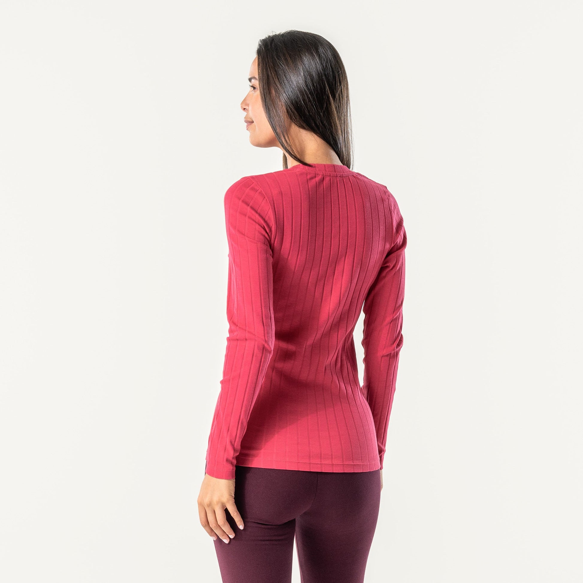 Chic silhouette of the women's organic cotton long sleeve T-Shirt, perfect for layering or worn as a standalone piece.