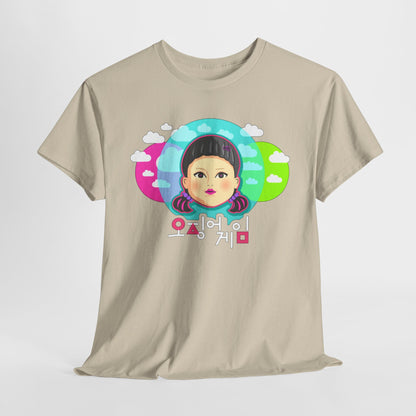 The 'Squid Game' Unisex T-Shirt displayed casually in beige, highlighting the artistic design of a playful character, perfect for making a fashion statement.