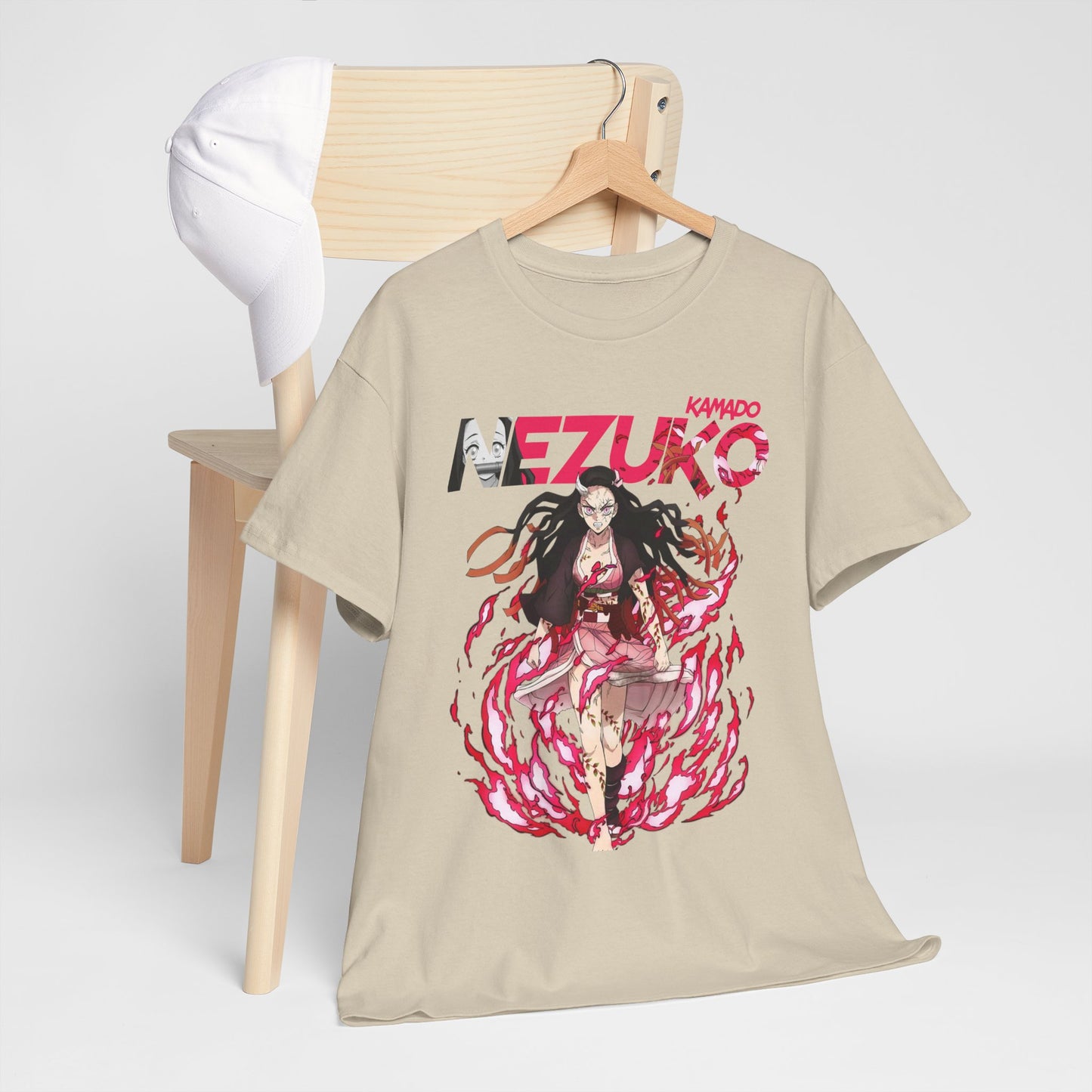 Chic Nezuko Kamado T-shirt styled alongside a cap, showcasing its versatility for casual or street style, appealing to fashion-forward anime lovers.