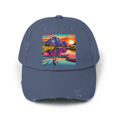 Unisex Distressed Paddleboarders Cap in a stylish hue, displaying a beautiful paddleboarding motif with vibrant sunset colours, crafted for luxury adventures.