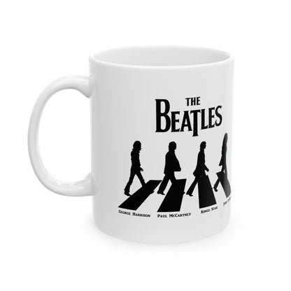 The Beatles Abbey Road Image Ceramic Mug - a premium quality 11oz mug featuring an iconic design with the silhouettes of The Beatles walking on the crossing, ideal for music lovers and collectors.