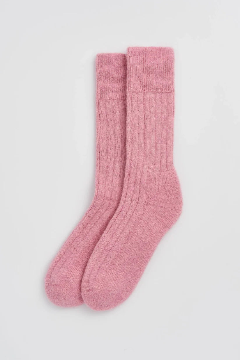 Luxury ultra soft alpaca bed socks with ribbed texture and cushioned sole, crafted in Portugal for ultimate comfort.