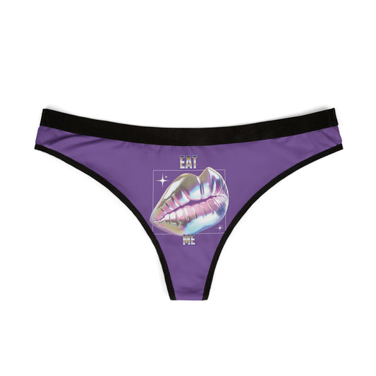 Luxurious "Eat ME" holographic thong in vibrant purple featuring an eye-catching 3D lip design, perfect for making a bold statement.