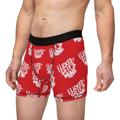 Valentines Naughty Cheeky Men's Boxer Briefs featuring the playful text 'I LICKED IT SO IT'S MINE' in bold white font on an elegant red background, showcasing a luxurious fit for romantic occasions.