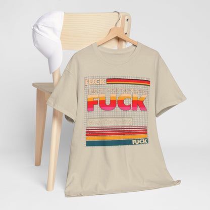 Luxury Retro Pop Art Unisex Men´s Women´s Graphic Cotton Funny T Shirt Tee Vintage alongside a stylish cap on a minimalist chair.