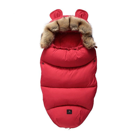 Dazzling Dreams Baby Stroller Sleeping Bag in radiant red, featuring luxurious cotton blend fabric and stylish fur-trimmed hood, perfect for ensuring your child's comfort and warmth during outings.