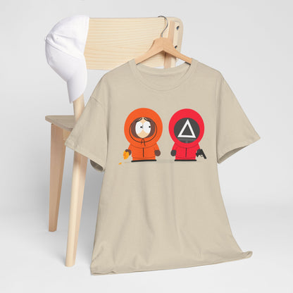 Squid Game South Park Unisex Men’s Women’s Graphic Cotton Funny T Shirt Tee displayed on a hanger with a white cap beside it, showcasing a mashup design featuring characters in vibrant cartoon style.