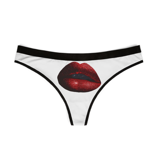 Sophisticated women's thong featuring a bold red lips design on a white background, ideal for adding a cheeky touch to intimate apparel.