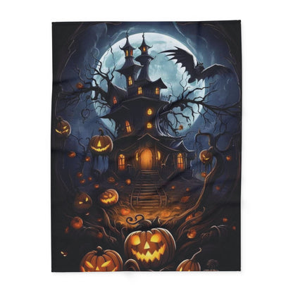 Decorative and Warm Halloween Spooky Arctic Fleece Blanket displaying a mythical haunted house, eerie trees, and enchanting jack-o'-lanterns, designed to elevate your Halloween celebrations with a sophisticated flair.