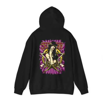 Showcasing the Empowered Sheriff hoodie in black, this design highlights a striking back print of a confident woman adorned with cowboy aesthetics and gold revolvers, embodying daring stylishness.