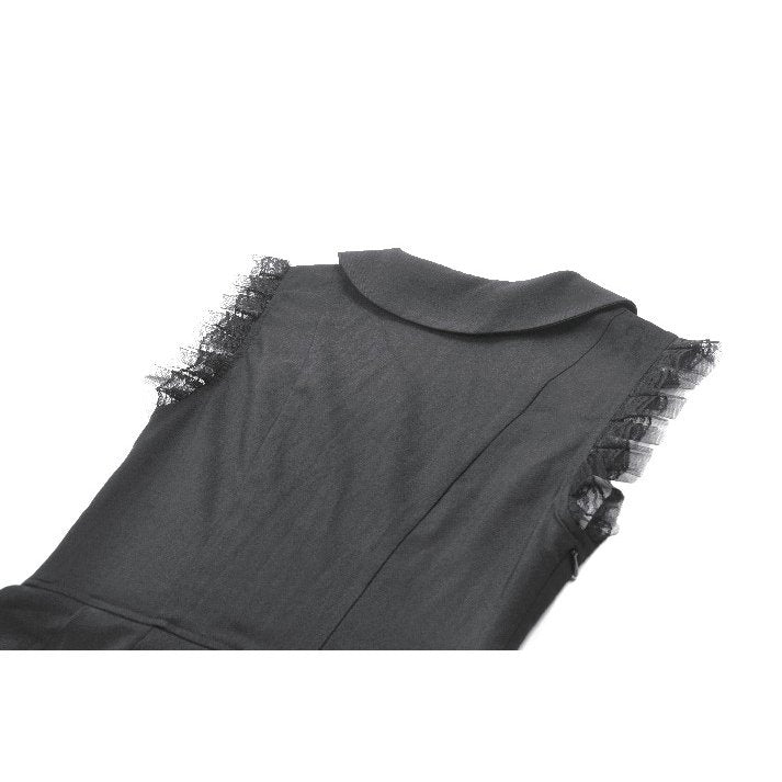 Model featuring the Dark In Love Gwendolyn Mini Dress, exhibiting a chic gothic look suitable for special occasions and dark tea parties.