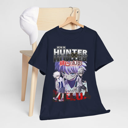 Navy blue Hunter x Hunter t-shirt artfully arranged on a chair alongside a stylish cap, highlighting the exquisite design of Killua and Gon for a trendy look.