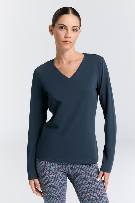 Elegantly crafted Organic Cotton Stretch Long Sleeve V-Neck Top for Women, featuring a luxurious body-skimming fit, perfect for layering or wearing solo.