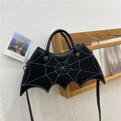 Halloween Spider Web Shape Shoulder Bag showcasing a unique spider web design, crafted from premium PU material, perfect for luxurious Halloween fashion.
