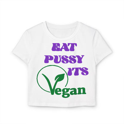 Luxurious white cropped t-shirt featuring a bold humorous vegan design with purple and green lettering that reads ‘EAT PUSSY ITS Vegan’. Perfect for adding a playful twist to your casual wardrobe.