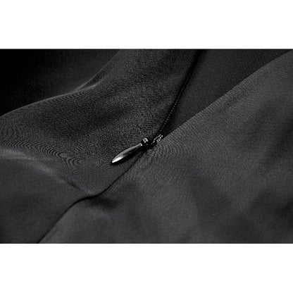 Model showcasing the Dark in Love Belladonna Black Goth Dress styled with gothic accessories, inspiring fashion-forward looks for tea parties and alt fashion events.