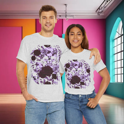Couple wearing Skulls and Roses Cotton Tees, embodying a stylish unisex graphic look, set against a colourful interior backdrop, ideal for alternative fashion lovers.