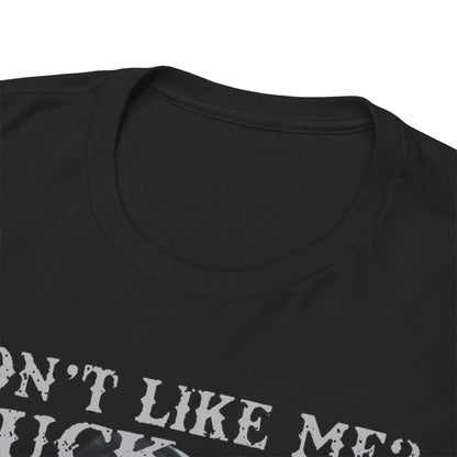Close-up of a luxurious black t-shirt collar, featuring a striking tattooed nun design and the statement 'DON'T LIKE ME? F*** OFF'. Perfect for discerning individuals seeking style and attitude.