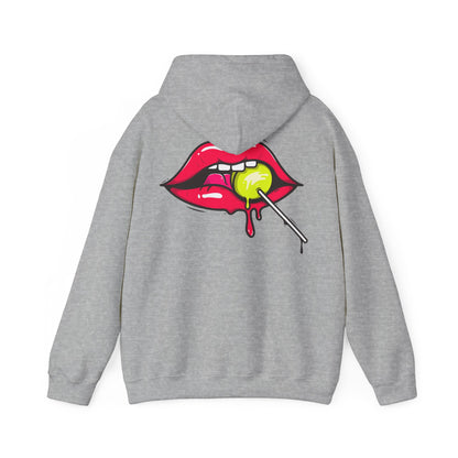 Luxurious grey hoodie adorned with a captivating print of luscious red lips and a lemon-yellow lollipop, offering a trendy blend of comfort and fashion.
