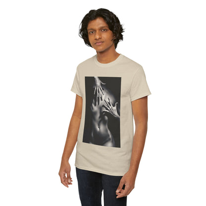Sophisticated individual showcasing a beige graphic t-shirt adorned with a creative print of hands on a torso, representing modern artistic expression.