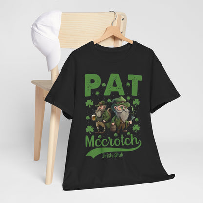 Black t-shirt on a wooden chair featuring the 'Funny St. Patrick’s Day T-Shirt - Pat McCrotch Irish Pub Graphic Tee for Men & Women' design, highlighted by cheerful cartoon leprechauns and green text.