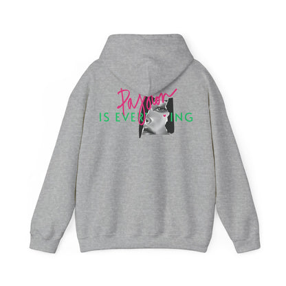 Sophisticated grey hoodie with a unique back design featuring the phrase 'Passion IS EVERYTHING' in flamboyant pink and green, alongside an artistic black and white women's portrait.