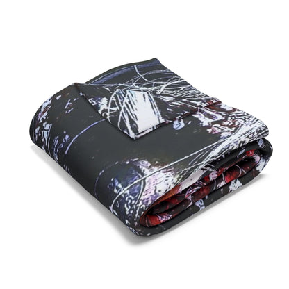 Decorative and Warm Halloween Spooky Arctic Fleece Blanket elegantly rolled, showcasing its soft polyester fleece material ideal for cozy nights.