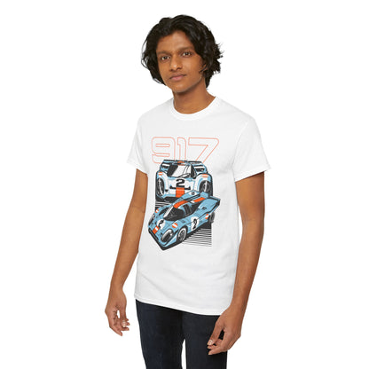 Young man wearing a Porsche 917 graphic t-shirt, presenting striking illustrations of race cars and '917' in an eye-catching design. Ideal for luxury streetwear.