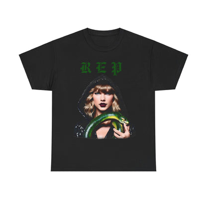 Taylor Swift Reputation Era unisex cotton t-shirt in black highlighting a stunning image of Taylor Swift in a glittery hooded attire, holding a green snake, ideal for ardent Swifties. Available in 8 colours.