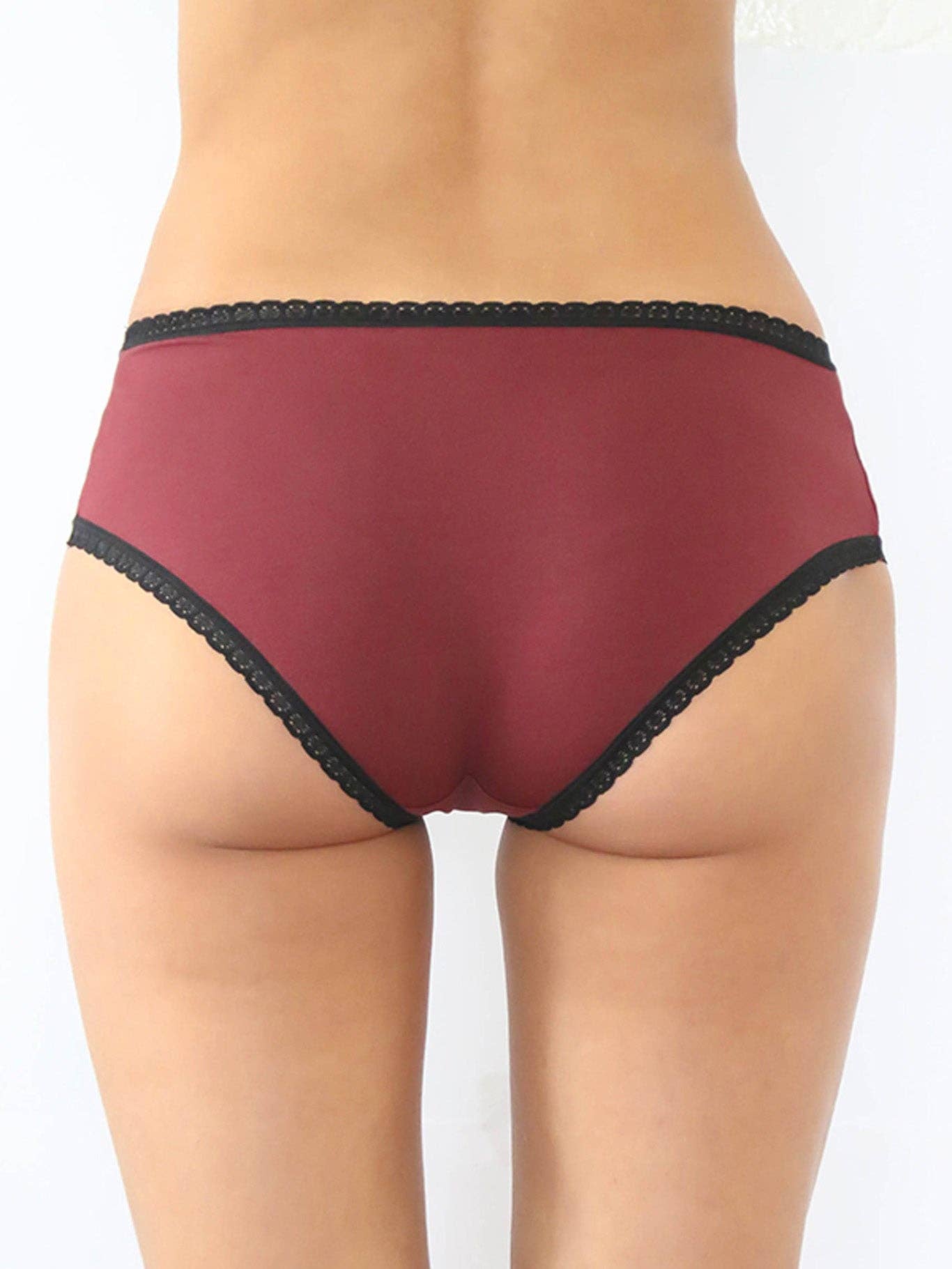 Soft lace trim and natural colour of luxurious organic cotton hipster briefs, designed for a stylish yet comfortable fit, showcased from different angles.