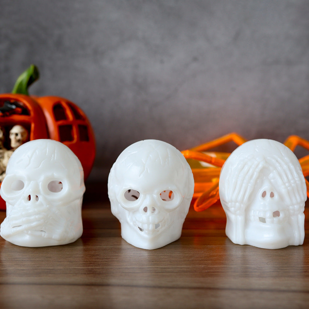 Elegantly crafted Halloween Skull Light Party Atmosphere Decoration showcasing three exquisite white skull designs, ideal for sophisticated Halloween celebrations.