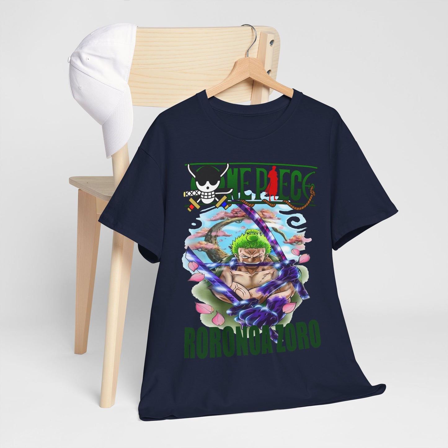 Chic navy Roronoa Zoro graphic tee styled on a wooden chair with a cap, illustrating versatility and contemporary fashion for anime lovers.