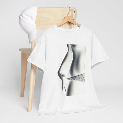 Chic white graphic t-shirt draped over a wooden chair, exhibiting a bold grayscale design of a woman's silhouette, perfect for an elegant yet playful look.