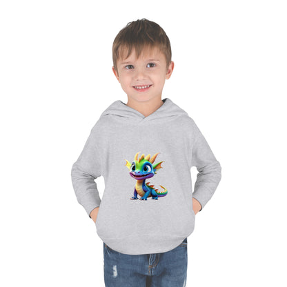 Playful little boy dressed in the Kids Unisex Cute Dino Hoodie featuring a vibrant dinosaur design, ideal for ages 2 to 5 years.