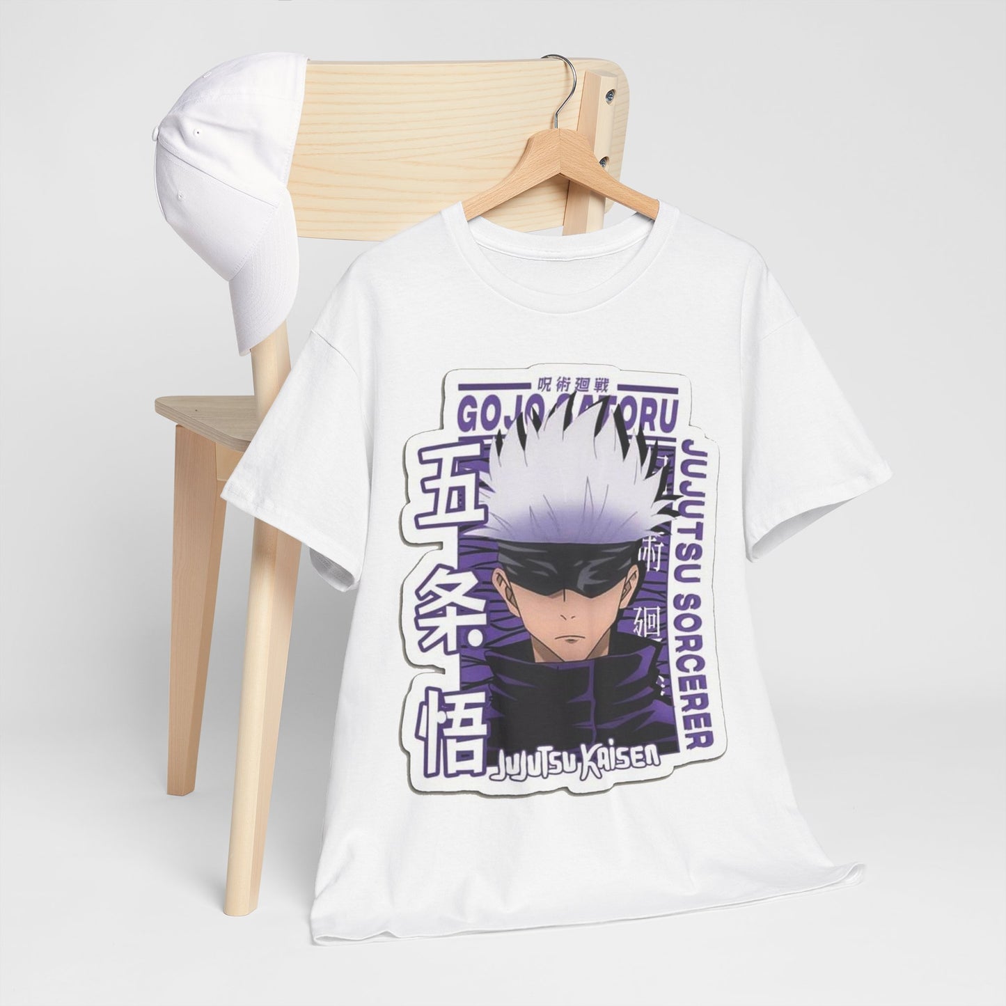 Luxury Gojo Satoru T-shirt artistically placed with a matching white cap, embodying chic anime fashion suitable for any casual occasion.