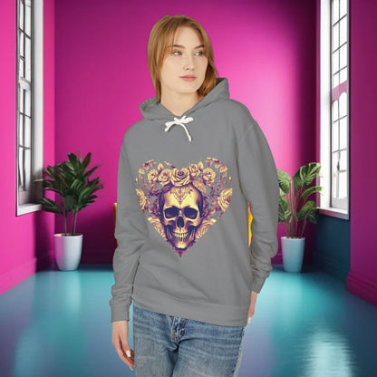 Model wearing a Skull and Roses Lightweight Hoodie in grey, showcasing its edgy designer style against a vibrant pink backdrop, perfect for fashion-forward individuals.