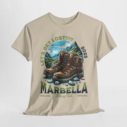 Chic Marbella Hiking Club Unisex Graphic Tee in soft beige, flaunting an eye-catching design of hiking boots and mountains, symbolising adventure and exploration.