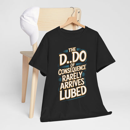 Sophisticated presentation of the Karma Funny Gift Graphic T-Shirt hanging, featuring the playful quote 'THE D.O. OF CONSEQUENCE RARELY ARRIVES LUBED' crafted in a striking design on black material.
