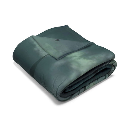 Luxurious rolled-up decorative and warm Halloween spooky Arctic fleece blanket, intricately designed with a mysterious dark theme, perfect for gifting or enhancing your Halloween experience at home.
