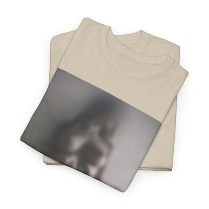Sophisticated t-shirt design displaying a shadowy image of a human figure, merging art with wearable elegance.