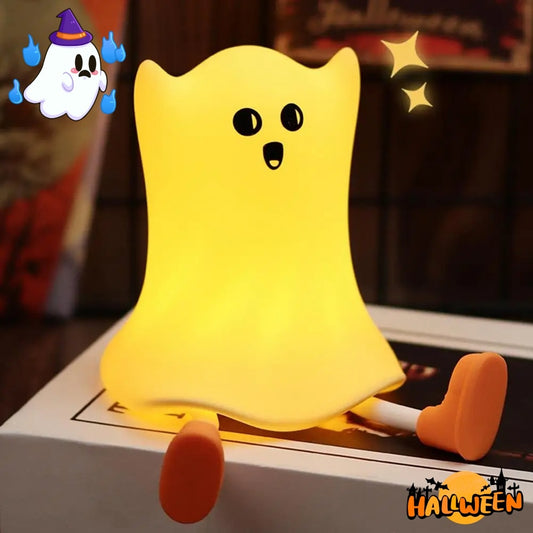 Elevate your Halloween decor with the Halloween Silicone Ghost Shaped Bedside Lamp, featuring a soft yellow glow and whimsical design, perfect for creating a magical atmosphere.