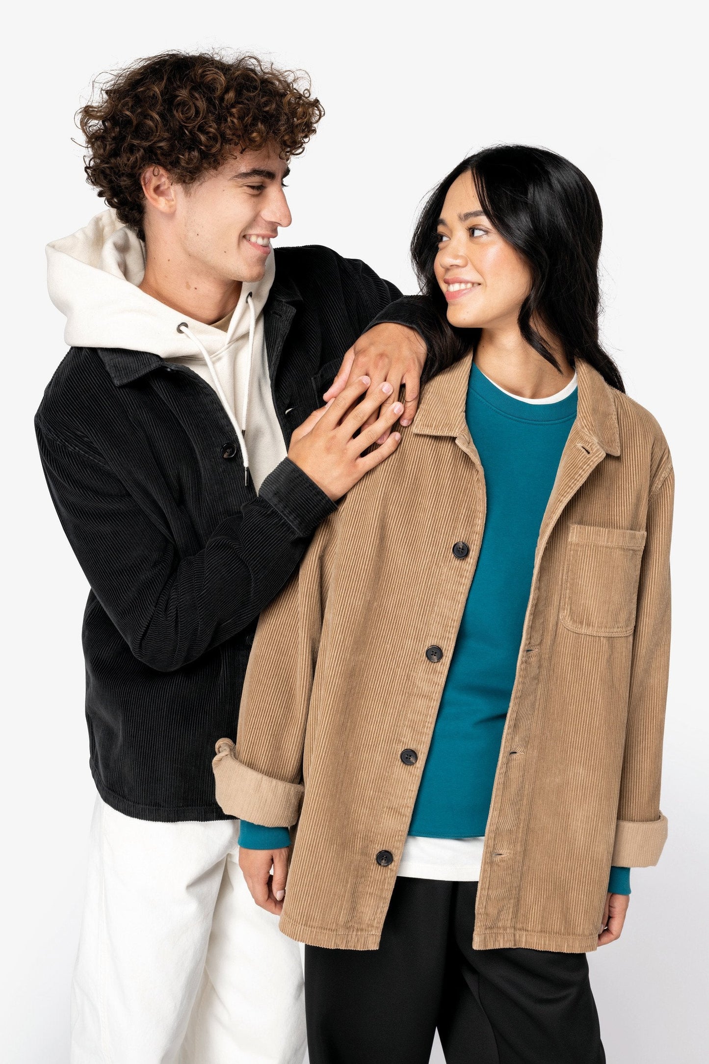 Full-length image of the versatile unisex organic cotton corduroy jacket, paired with stylish outfits to reflect a chic lifestyle.