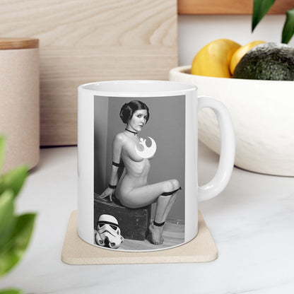 Funny Princess Leia Mug - Ceramic Star Wars drinkware featuring a bold design with a whimsical portrayal of Princess Leia. Perfect for fans, displaying nostalgia and humour, alongside a Stormtrooper helmet on a stylish coaster.