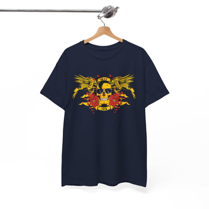 Elegant navy blue t-shirt hanging on a wooden hanger, showcasing a striking yellow skull design with wings and red roses, exemplifying timeless style and fearless spirit.
