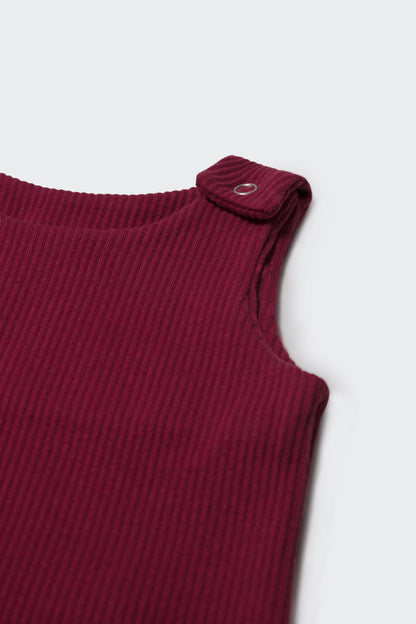 Chic baby dungarees by DreamBuy in rich claret red, designed for sensitive skin and perfect for stylish occasions or everyday wear.